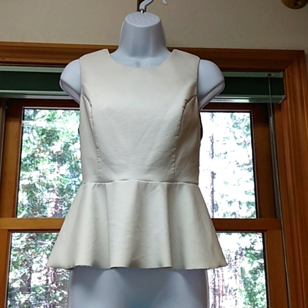 Vegan leather white INC International Concepts top. Sleeveless, black back. NWOT